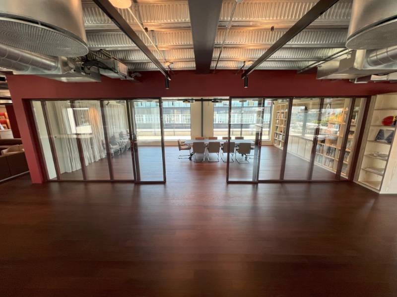 Stylefold Hinged sliding folding acoustic moveable wall - glass partition for Orms HQ, London