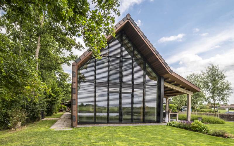 Unique Louvres For a Stylish Barn House in Papekop