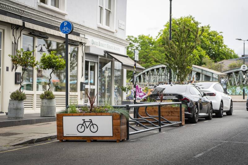 Enhancing Urban Mobility with Dedicated Dockless Bike Parking Bays