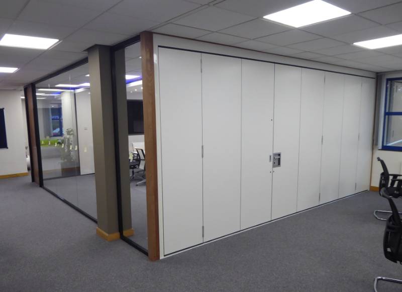 Stylefold Hinged sliding folding acoustic moveable wall
 installed at Cemar Offices