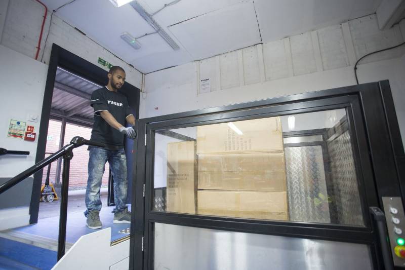 Stannah Levelmaster low-rise platform goods lift – solving stock flow in a split-level storeroom