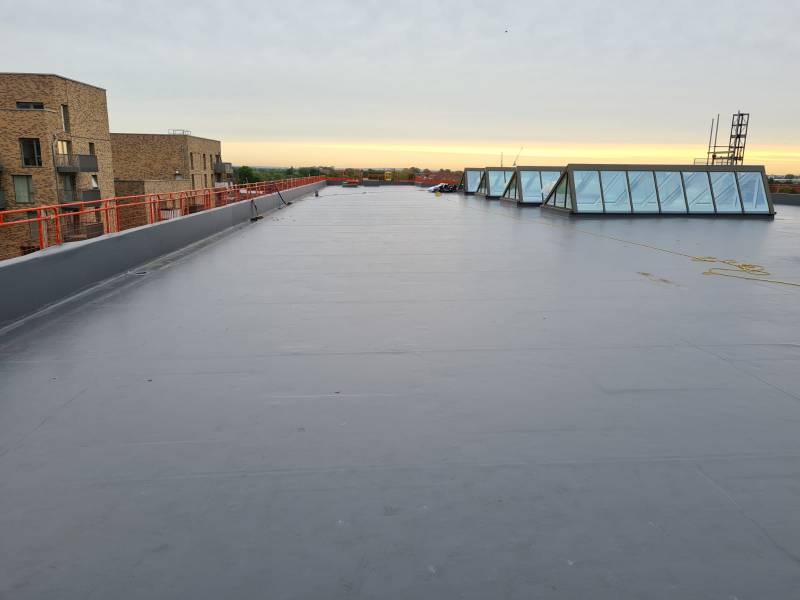 Flat roof covering systems