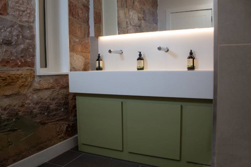 Dalkeith Country Park upgrades their Washrooms with bespoke Solid Surface, Wall Panels and Cubicles.
