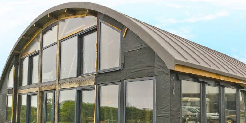 Woodholm Curved Metal Finish Roof