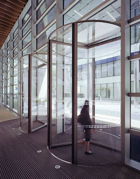 Two 3.8m Tall Circular Full Vision Revolving Doors-                    Watermark Place, London